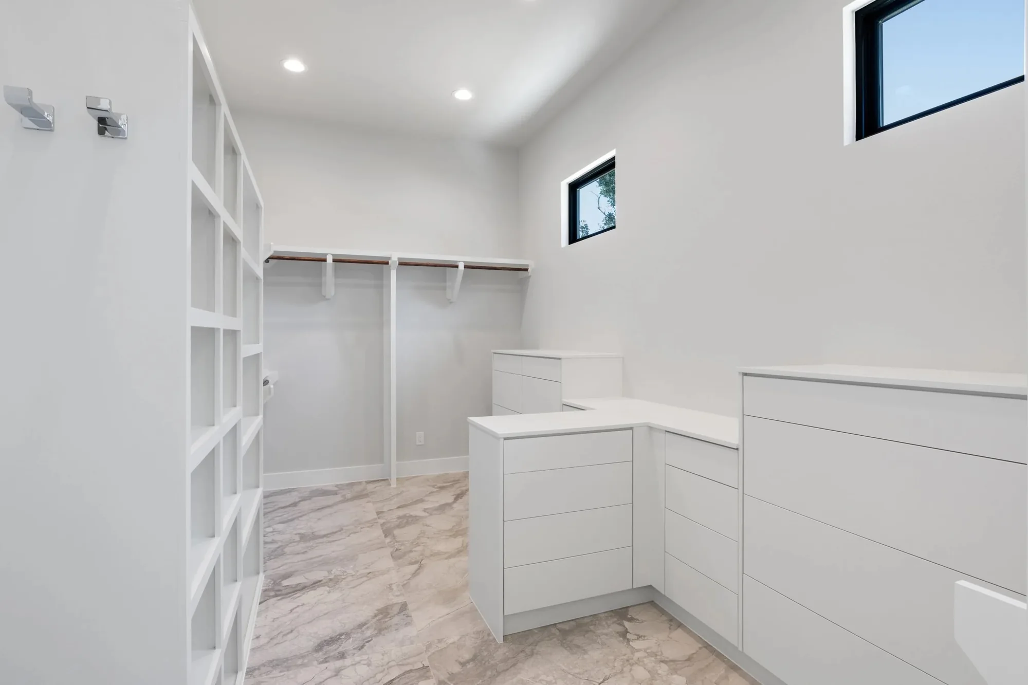 Custom closet with built-in drawers and hanging space