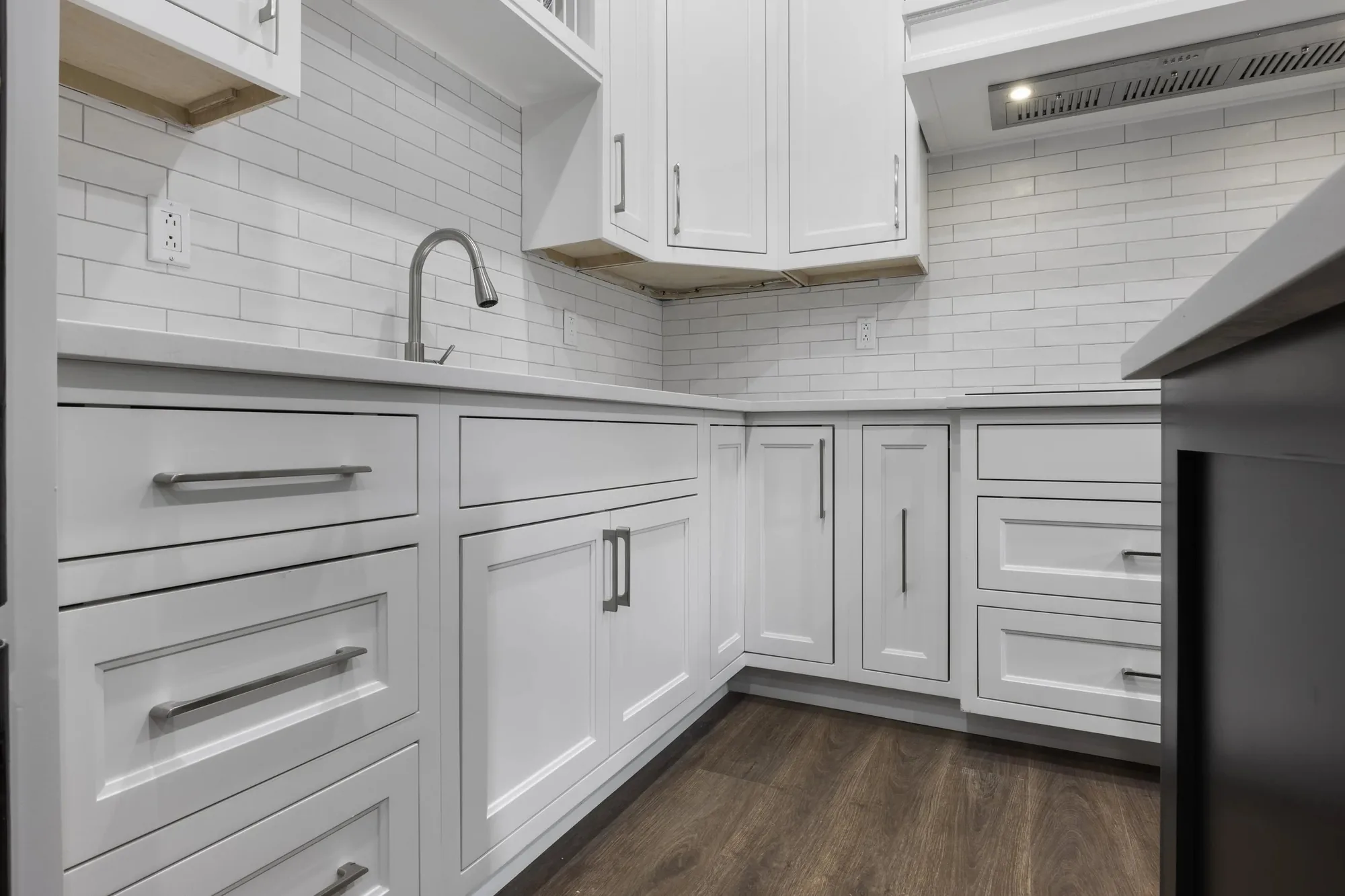 Smart storage drawers and cabinets in a compact kitchen